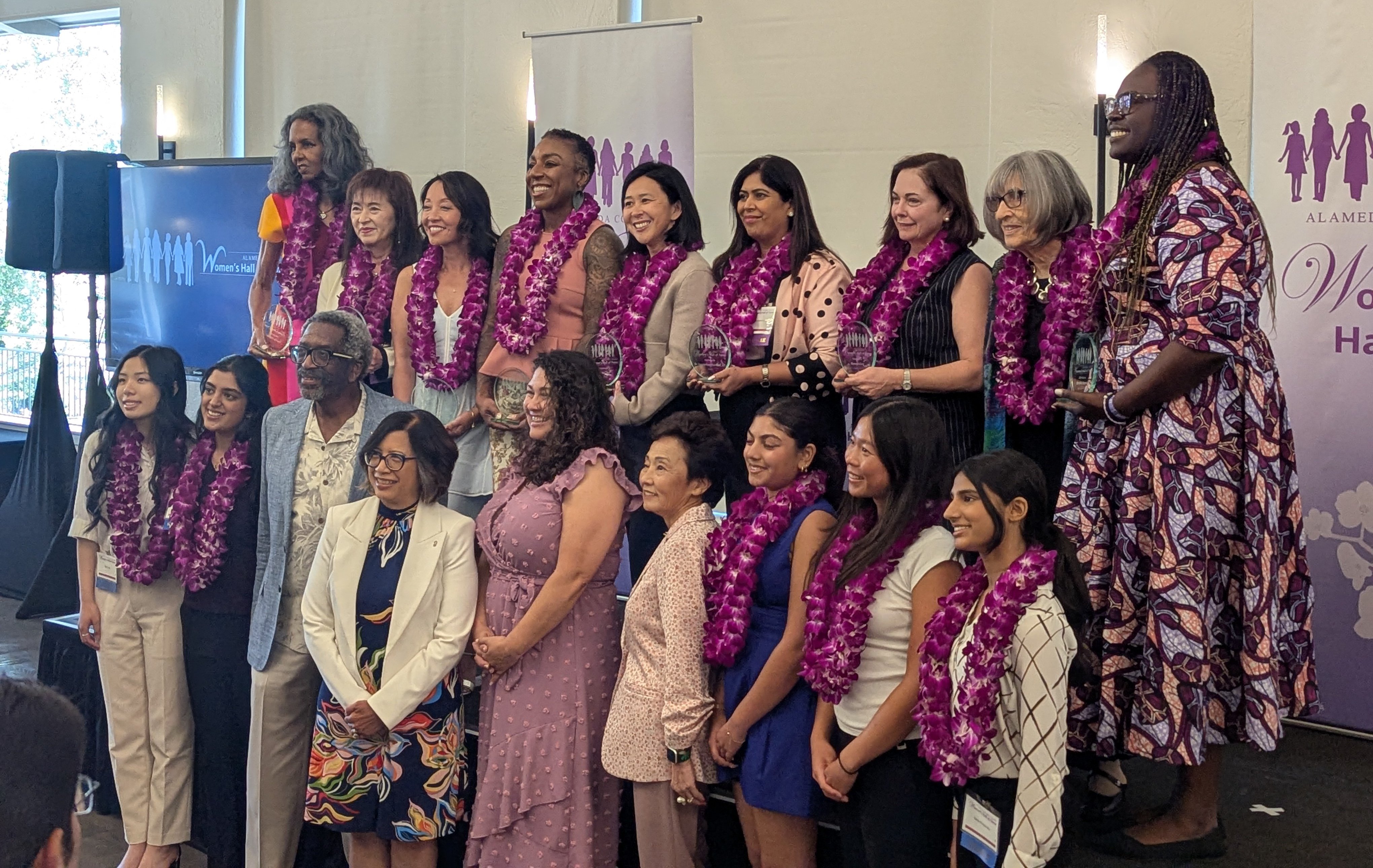 two rows of women standing and smiling; these are the women inducted into the Alameda County Women's Hall of Fame on March 28, 2026.