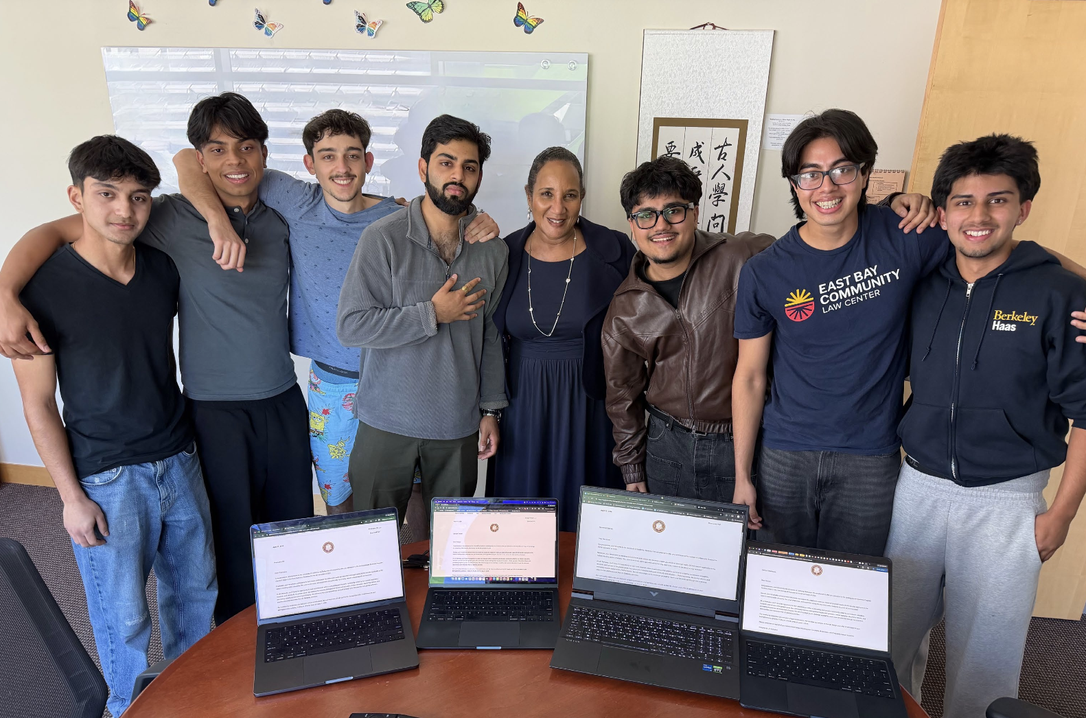 Berkeley City College students open their UC Berkeley admissions letters with BCC President Dr. Denise Richardson. All four students were accepted to UC Berkeley!