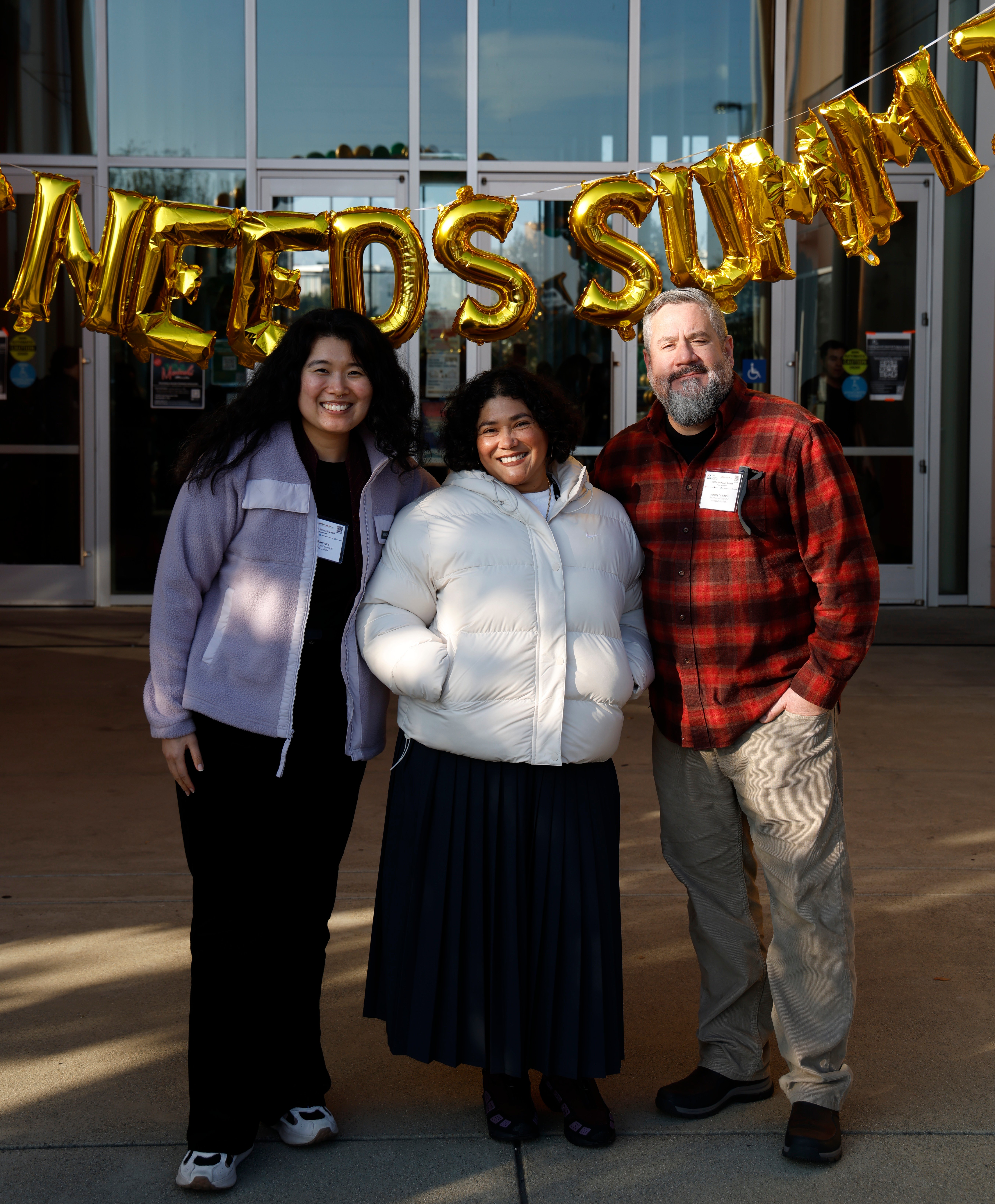 Izzie, Susanna, and Jeremy at the Basic Needs Summit