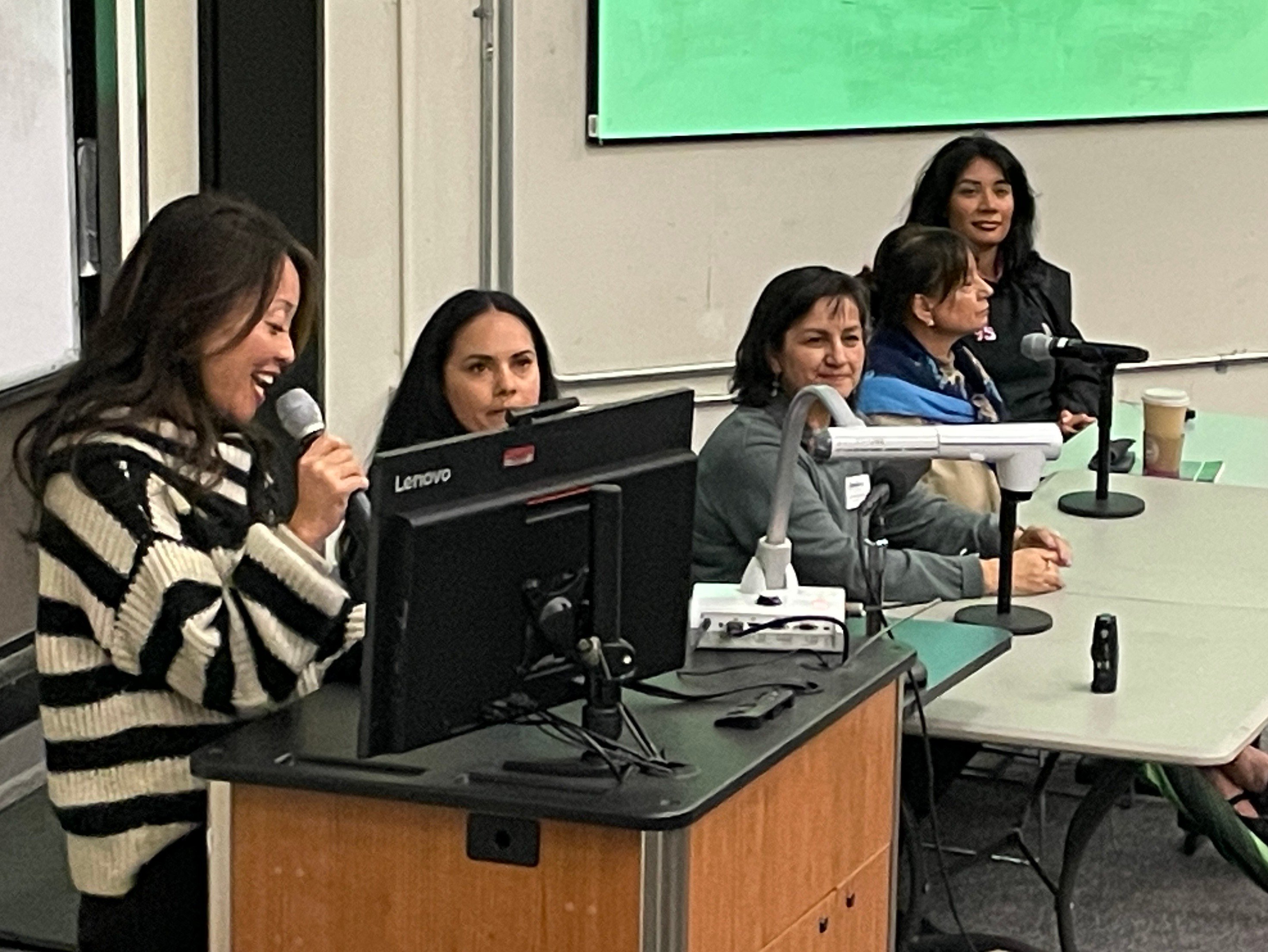 Dr. Tammeil Gilkerson provides comments before a Laney College panel featuring women entrepreneurs