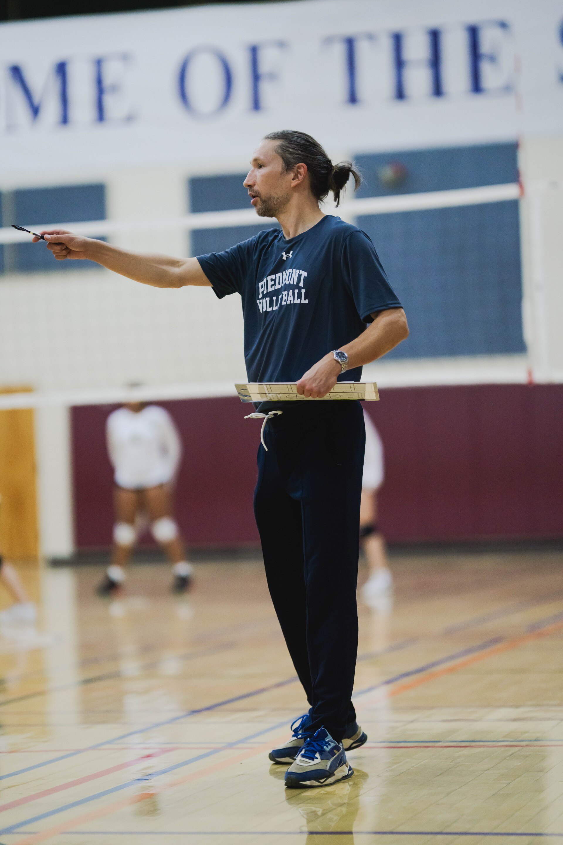 Justin Hoover coaching volleyball