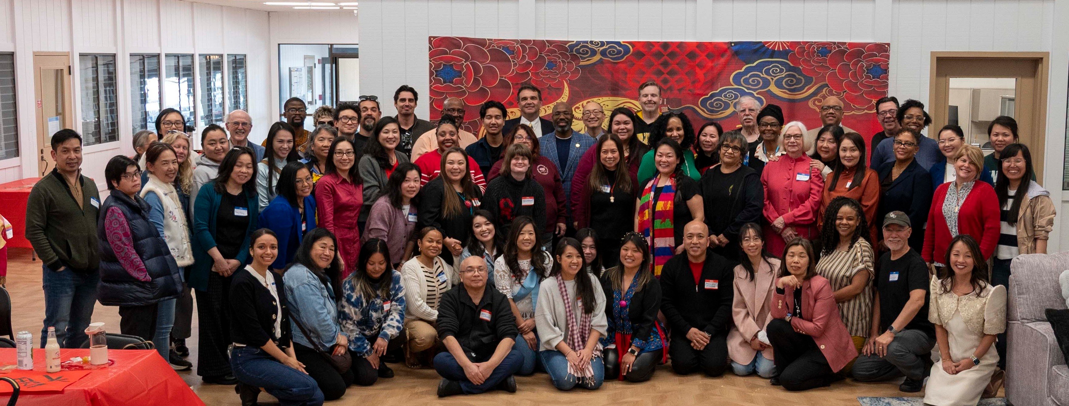 A large group photo of Peralta Community College District students and employees pose for a Lunar New Year photo