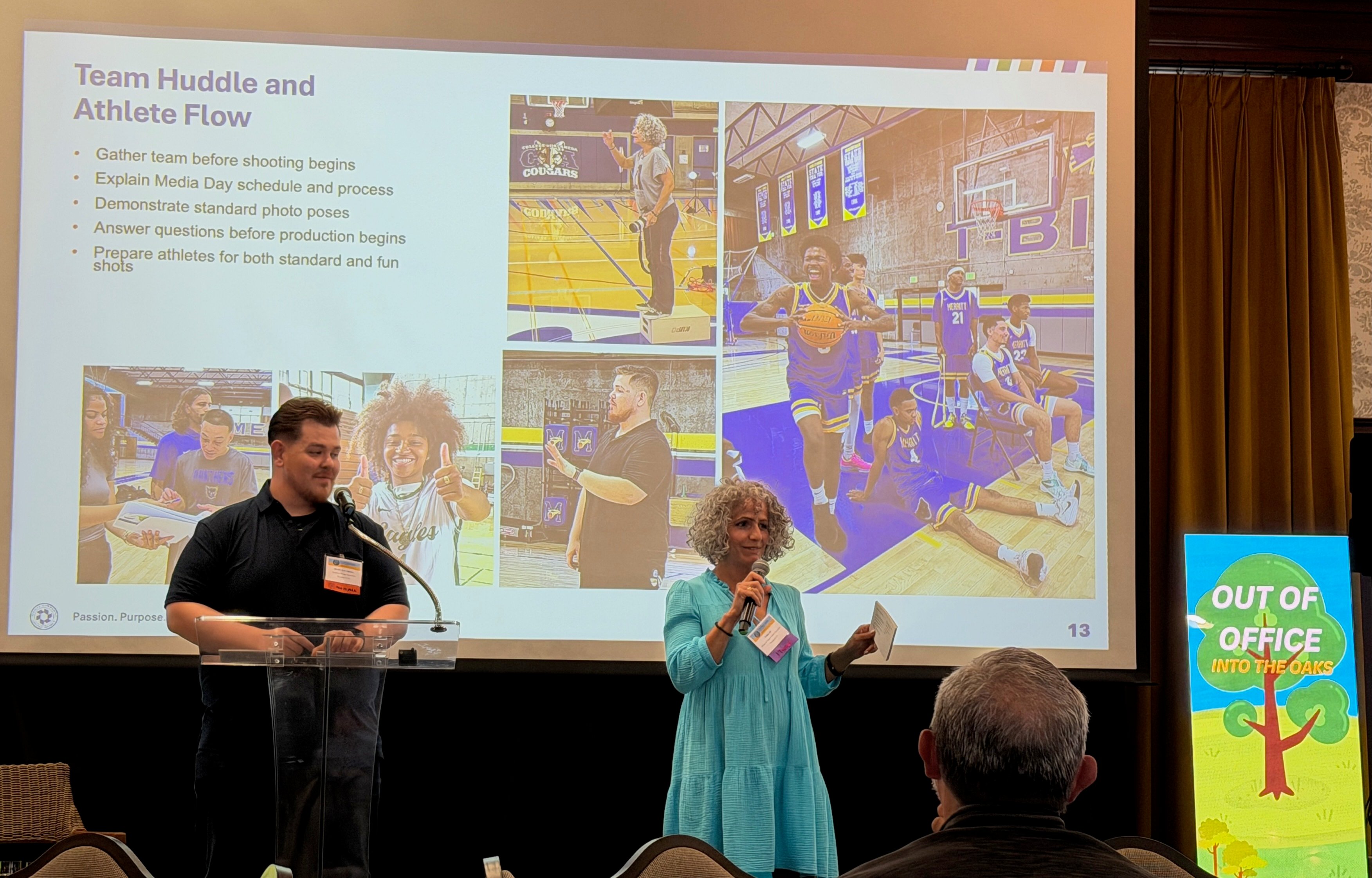 Man and woman on stage giving a presentation - they are Marcus Creel and Faiza Ali