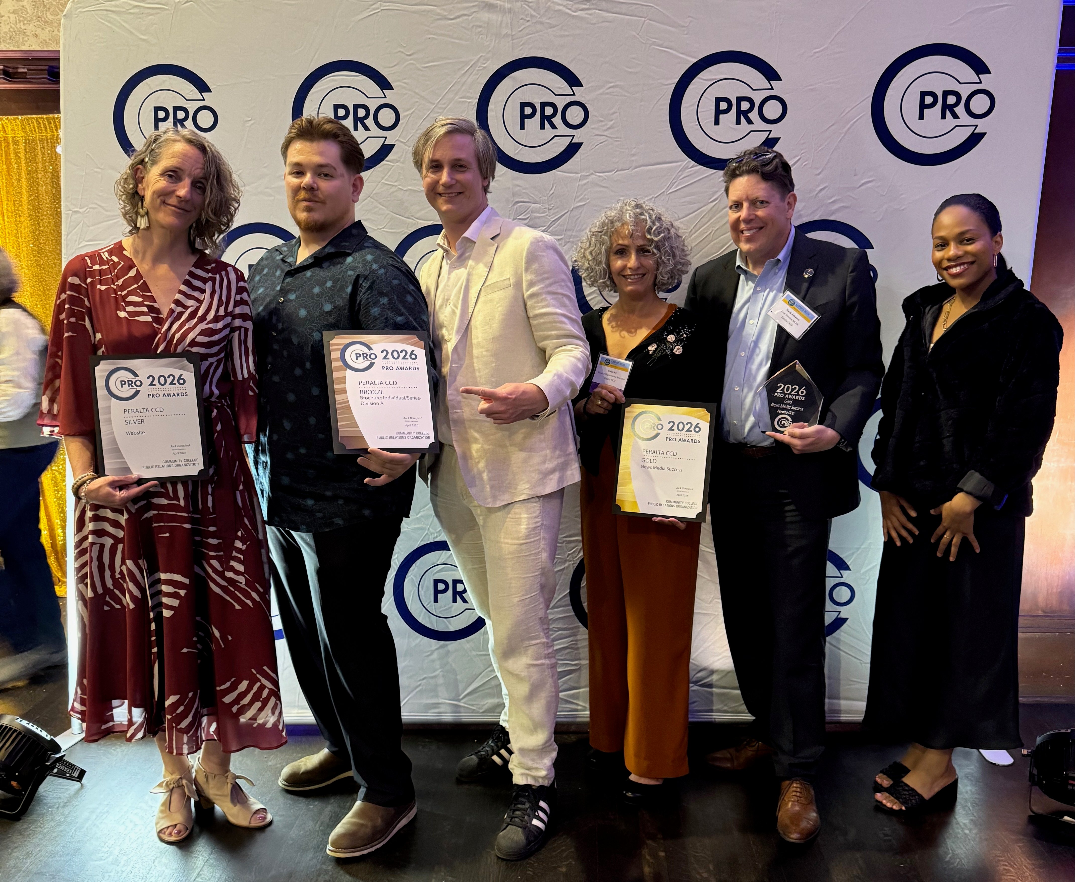 The Peralta CCD team smiling at the CCPRO 2026 awards dinner, left to right: Chanda Brewer, Marcus Creel, Tom Rizza, Faiza Ali, Mark Johnson, and Jasmine Bledsoe