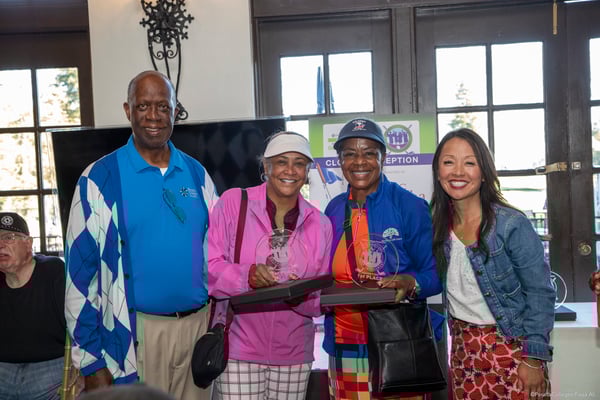 Dr. Bill Riley and Dr. Tammeil Gilkerson present awards to the winners of the 2025 Peralta Colleges Foundation Golf Tournament