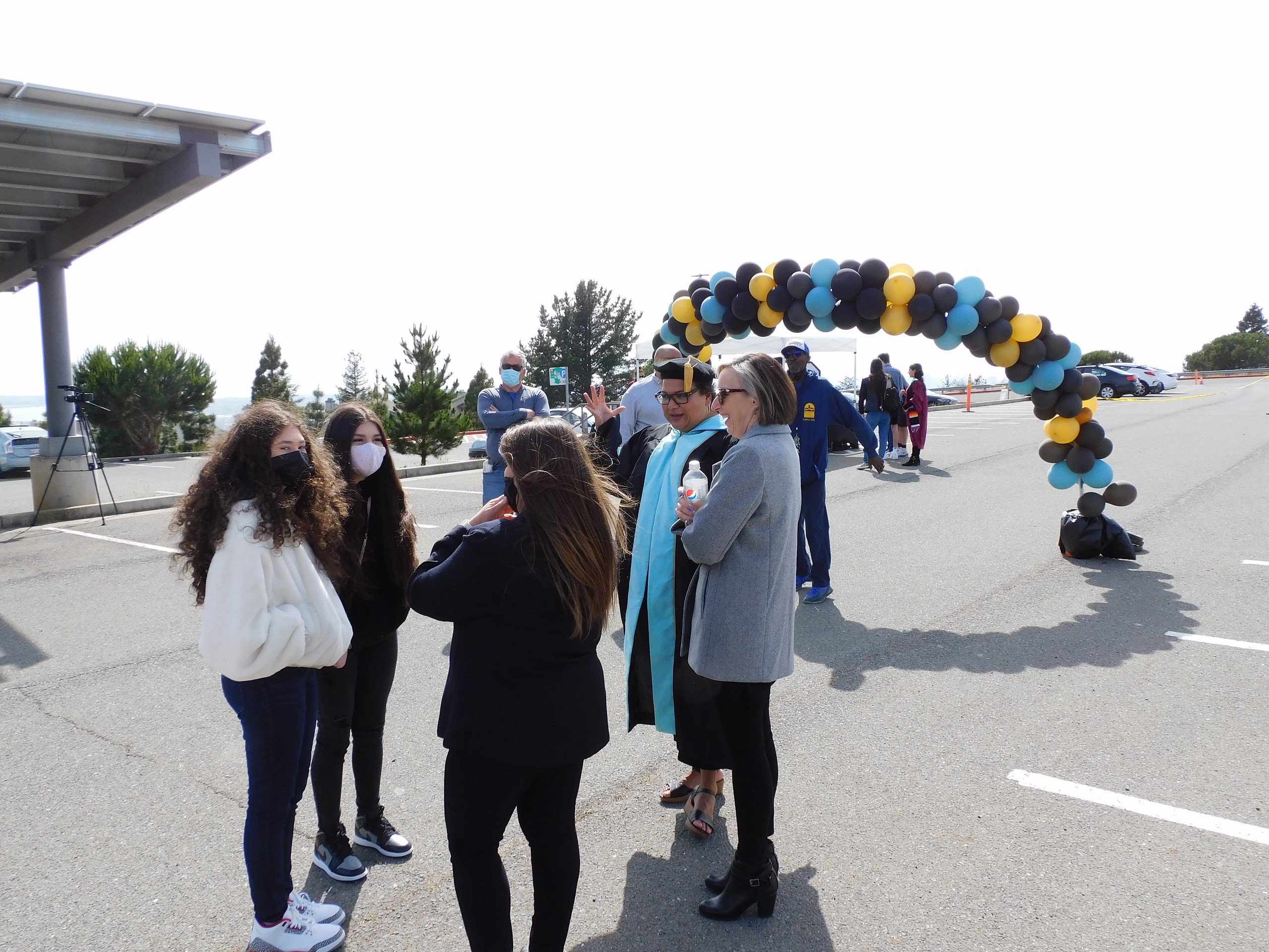 Pres Garcia and Deputy VC Droker share a laugh with students