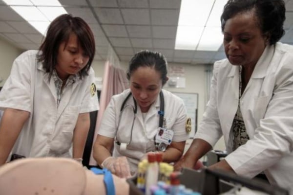 Nursing students practice